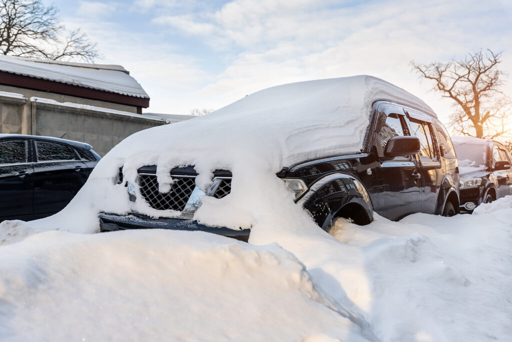 Snow covered car.