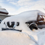 Snow covered car.